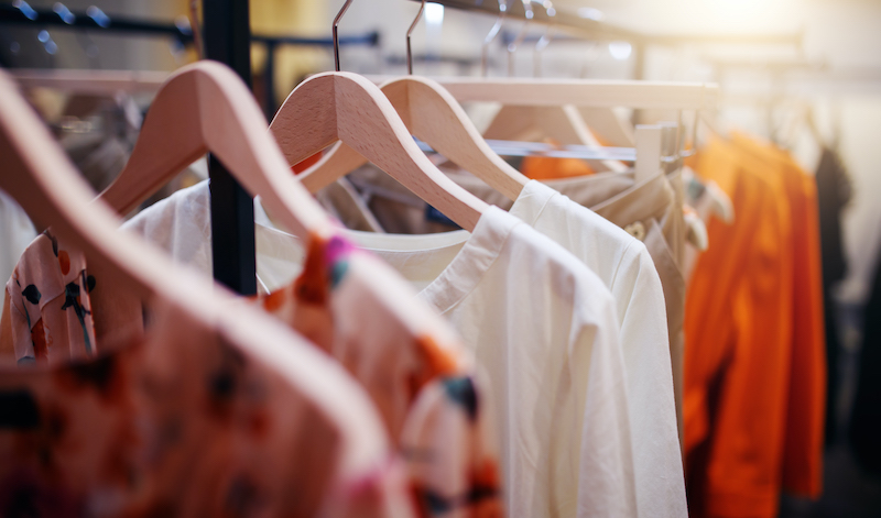 Clothing hanging on a rack.