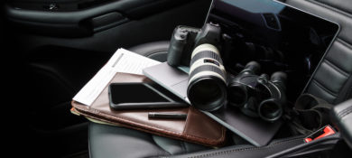 Surveillance equipment in the front seat of a car.