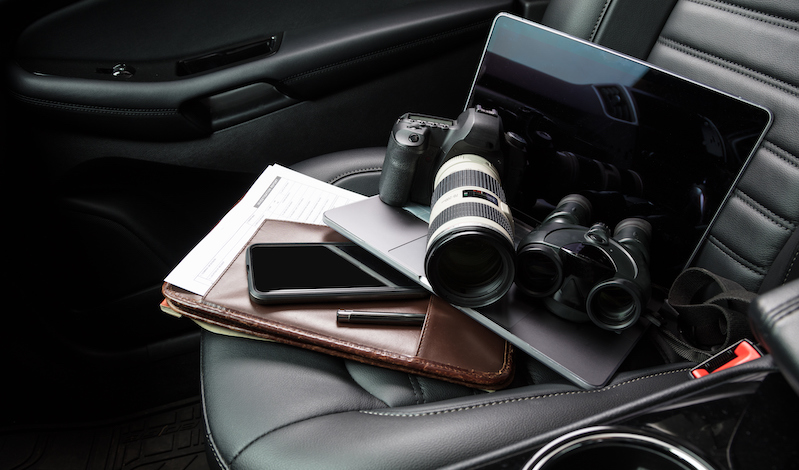 Surveillance equipment in the front seat of a car.